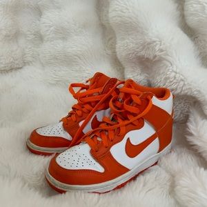 Nmike high tops orange and white! size 3.5! So cute and comfy! Barley worn!!!!!!